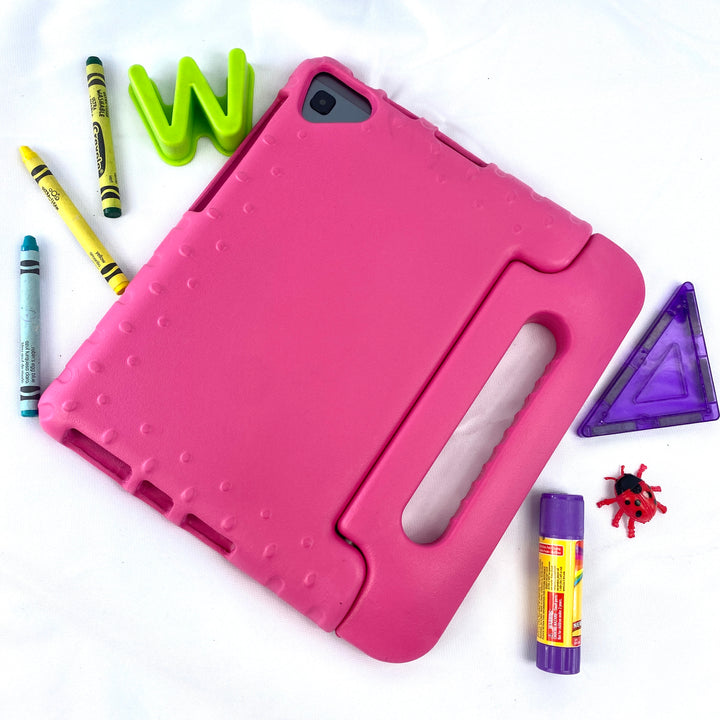 A tablet covered in a pink foam case. The case has a handle. #color_hot-pink