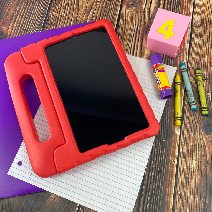 A tablet covered in a red foam case. The case has a handle. #color_red