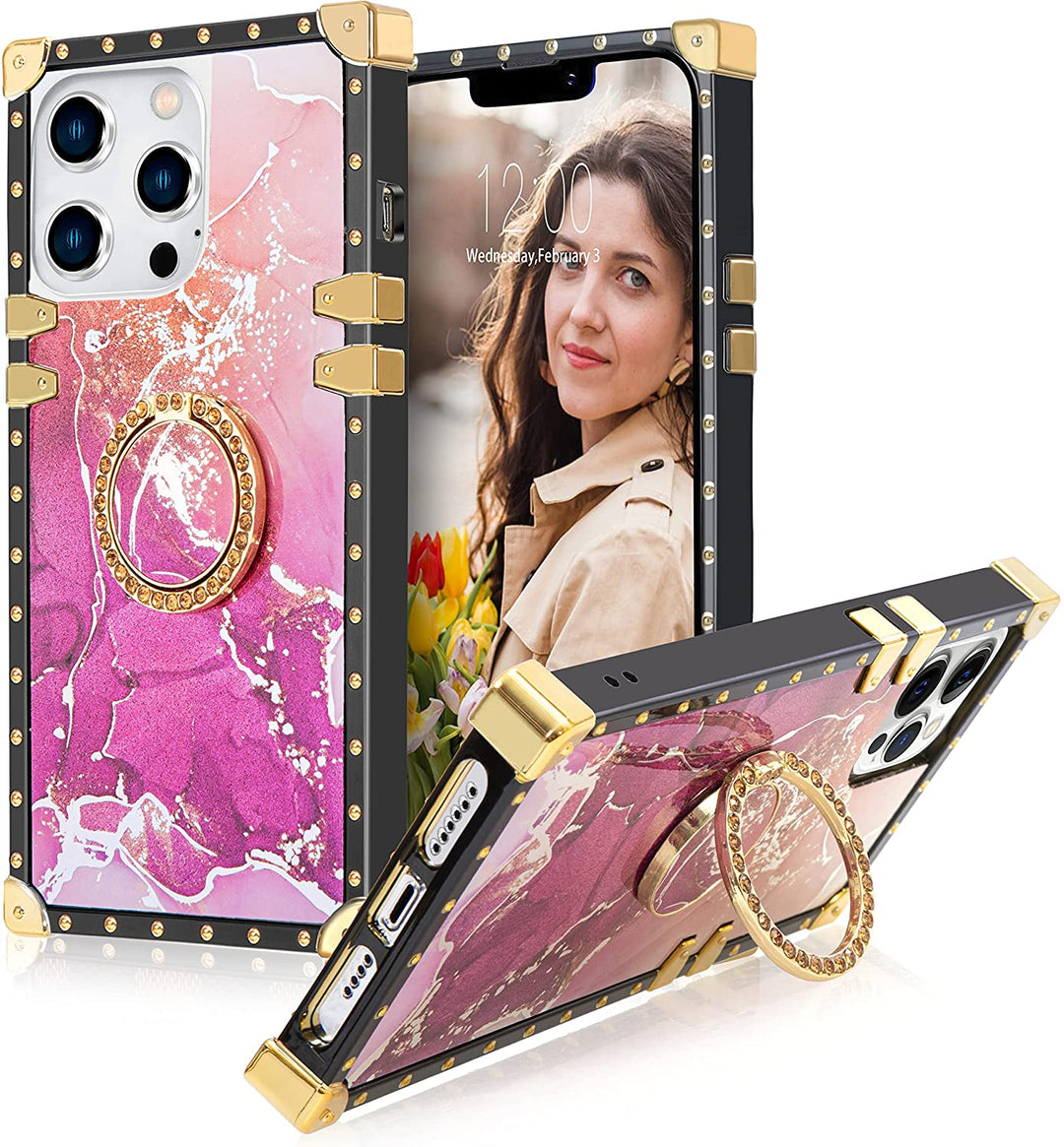 An Apple iPhone 13 Pro case; ring-handle-kickstand; rectangular-shaped; black trim with gold-rivets; gold corner bumpers; with pink marble pattern. #color_marble-holo-light-pink-hot-pink