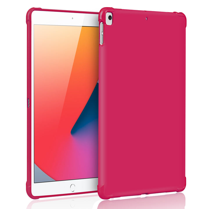 A pink silicone case with corner-bumpers covering the back of an Apple iPad. #color_hot-pink