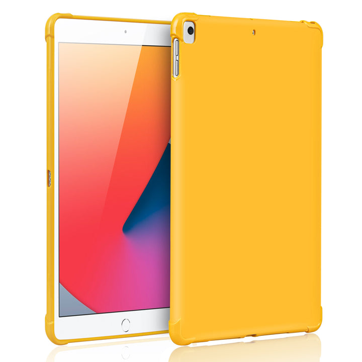 A orange silicone case with corner-bumpers covering the back of an Apple iPad. #color_orange