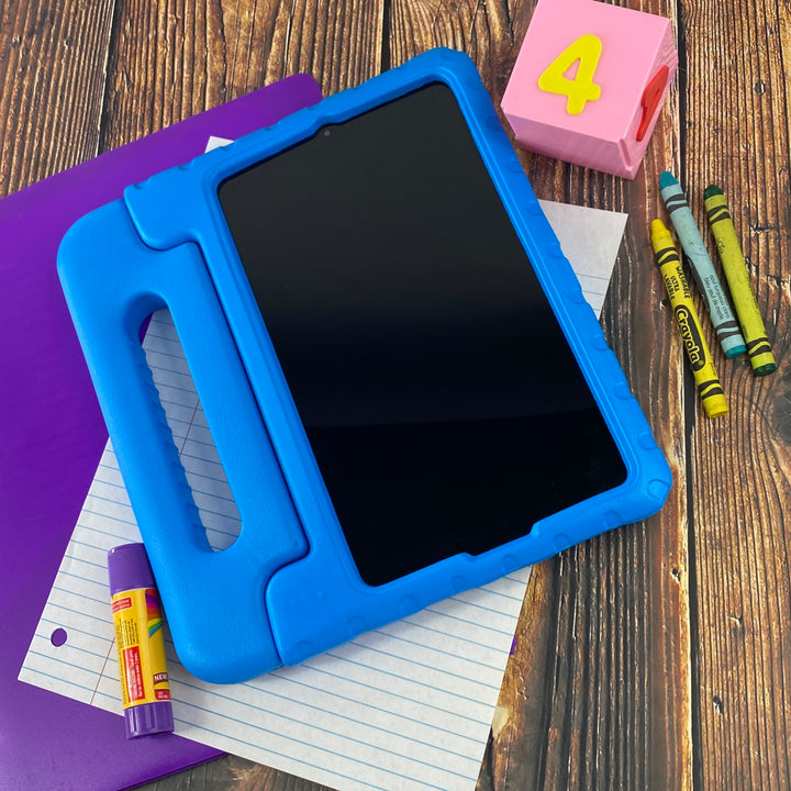 A tablet covered in a blue foam case. The case has a handle. #color_blue