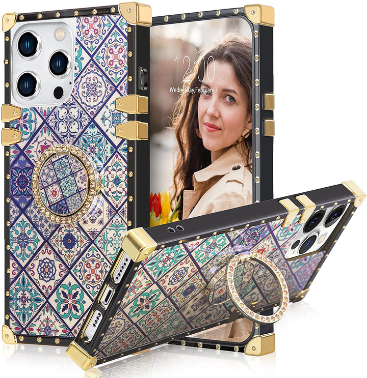 A box-shaped, TPU, iPhone 12 Pro Max case, with gold corner bumpers and gold rivets on its black borders. The case’s back is designed with interlocking diamond-mosaics. It also has a gold trim ring that doubles as a handle and kickstand. #color_blue-colorful-diamond-shapes