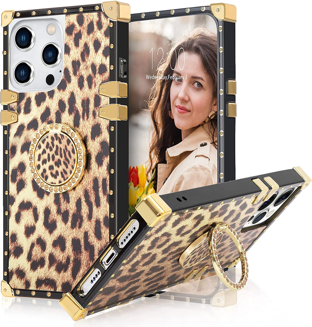 An Apple iPhone 13 Pro Max case; ring-handle-kickstand; rectangular-shaped; black trim with gold-rivets; gold corner bumpers; with leopard patterns. #color_leopard