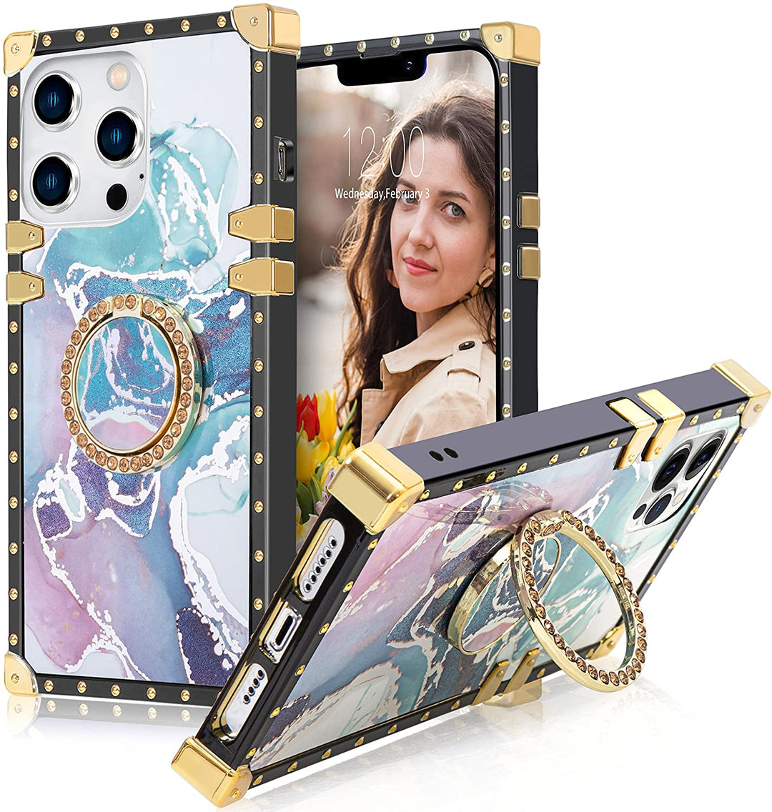 An Apple iPhone 13 Pro case; ring-handle-kickstand; rectangular-shaped; black trim with gold-rivets; gold corner bumpers; with blue-white-purple marble pattern.#color_marble-holo-blue-purple-white
