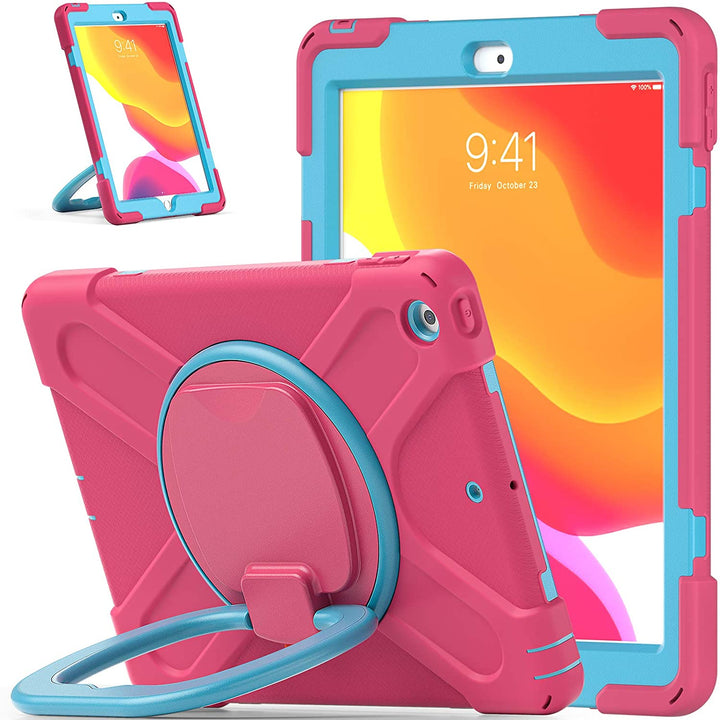 An Apple iPad case, made of pink silicone and blue polymer, with a ring kickstand. The kickstand is extended to hold a tilted iPad. #color_pink-light-blue