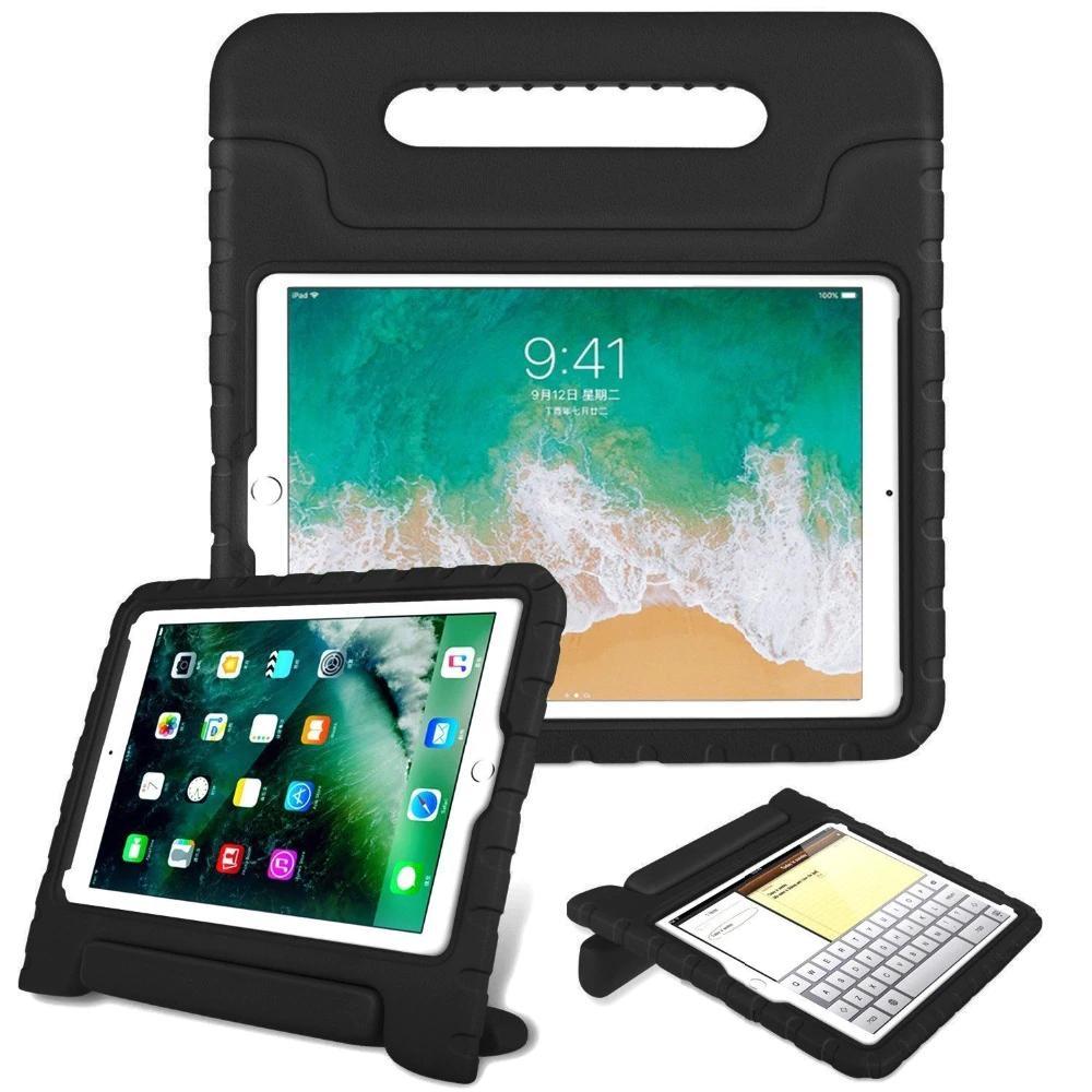 A black EVA foam case housing an iPad 10.2. Its integrated kickstand handle is used to hold the iPad upright and tilted in a landscape position. #color_black