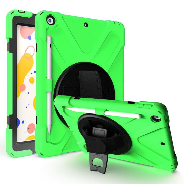 A green Shield case made of black polymer and green silicone encasing an iPad 10.2. The Shield case has an integrated Apple Pencil holder with a hand strap and kickstand. The kickstand is extended to hold the case and iPad in a tilted position. #color_green