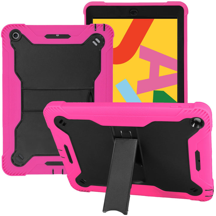 An Apple iPad 9.7 in a Guardian case. The Guardian case is made of black polymer and pink silicone. It also has a kickstand extended to keep the iPad in a tilted, landscape position. #color_black-hot-pink